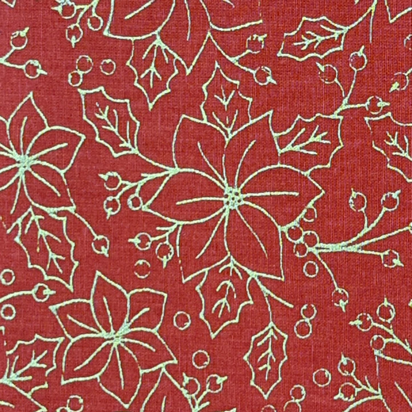 Tejido de flor navideña color dorado.
