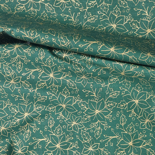 Tejido de flor navideña color dorado.