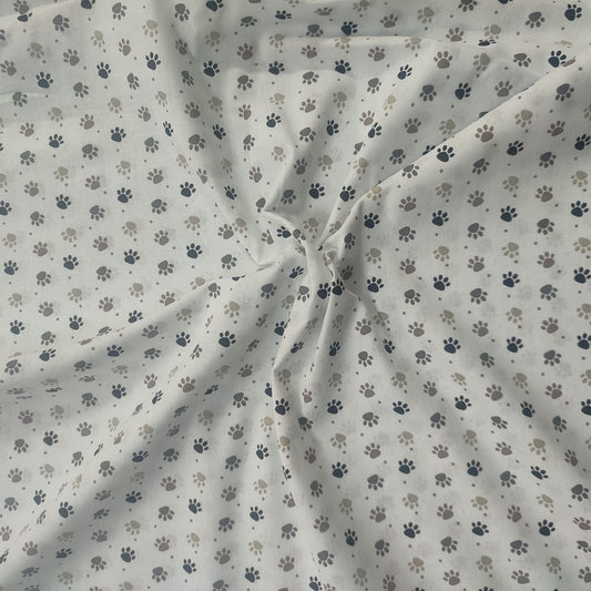Tela Algodón huellas de mascotas blanco