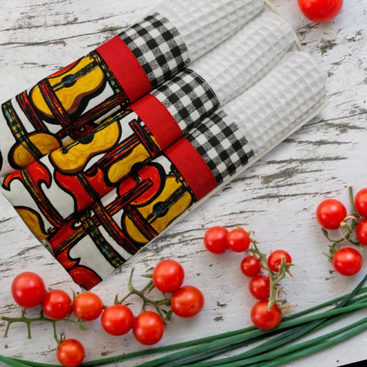 Juego de 3 paños de cocina guitara con Cucharas a juego.