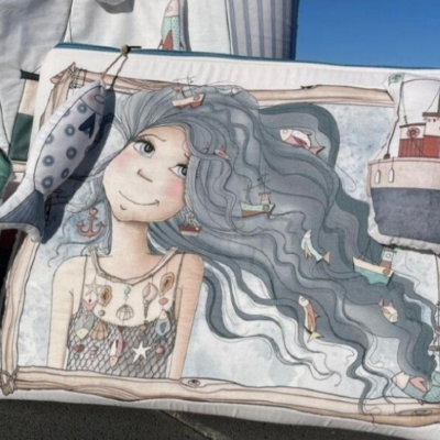 Panel neceser Playero hablando de sirenas